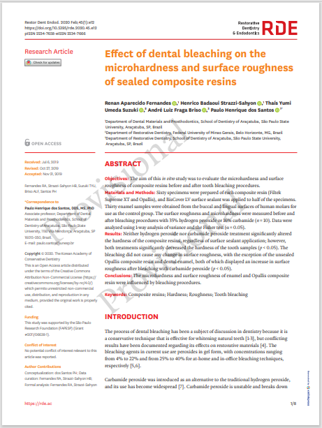 Effect of dental bleaching on the microhardness and surface roughness of sealed composite resins