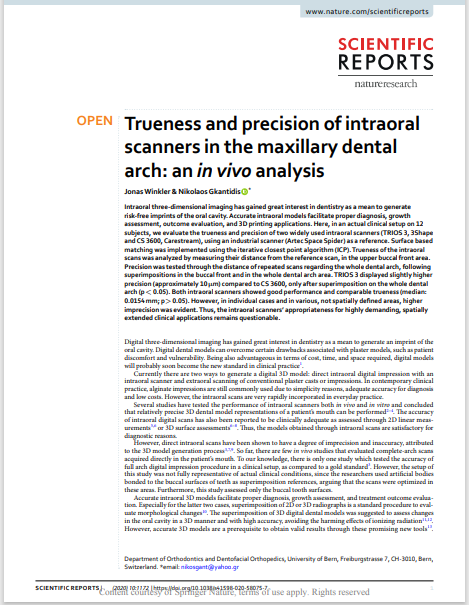 Trueness and precision of intraoral scanners in the maxillary dental arch: an in vivo analysis